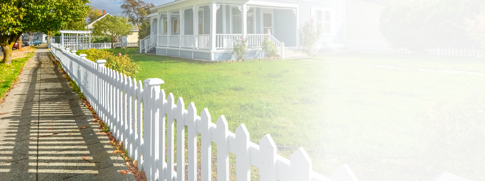 wide yard with vinyl fence